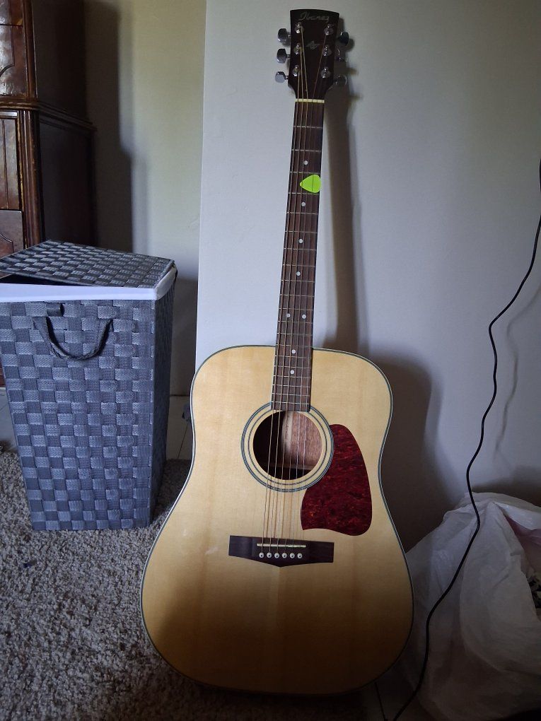 Ibanez AW, comes with a soft case and a tuner