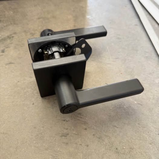 Multiple Black Kwikset Lever handle