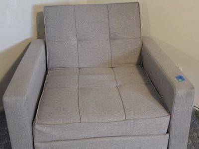 Grey fabric convertible sleeper chair