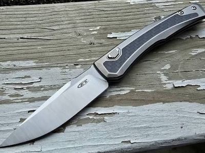 Zero Tolerance ZT 0556 Auto – Titanium w/ Carbon Fiber Inlay – MagnaCut Blade