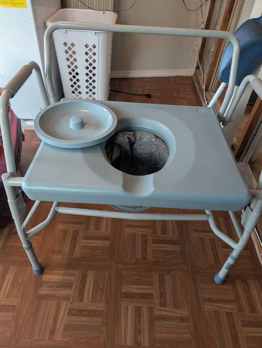 DMI Drop Arm Portable Toilet Commode, Extra-Wide Seat, 500 Pound Weight Capacity, Bucket with Lid Included, Adjustable Legs,