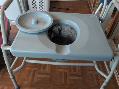 DMI Drop Arm Portable Toilet Commode, Extra-Wide Seat, 500 Pound Weight Capacity, Bucket with Lid Included, Adjustable Legs,