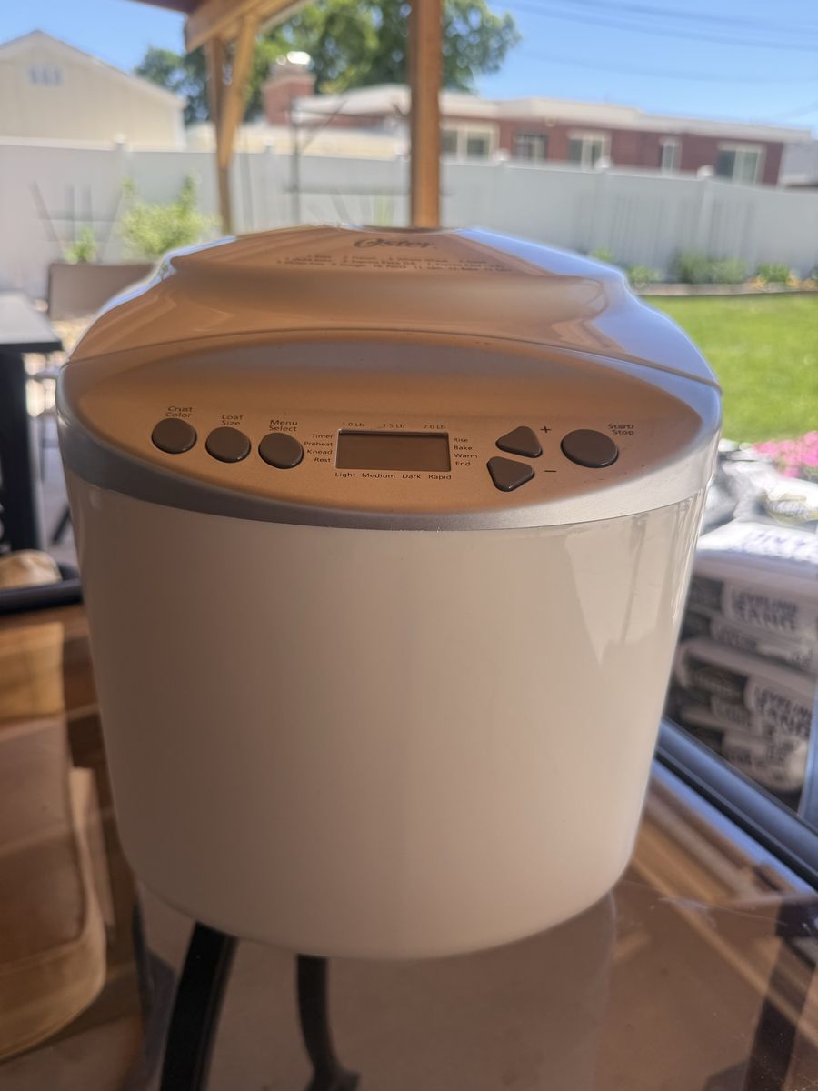 Oster CKSTBR9050 2lb. Express Bake Bread Maker - White, new never been used