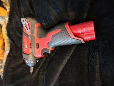 Milwaukee M12 hammer drill with battery