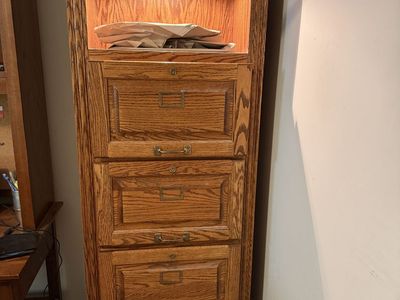 Solid oak file cabinet with lighting and glass