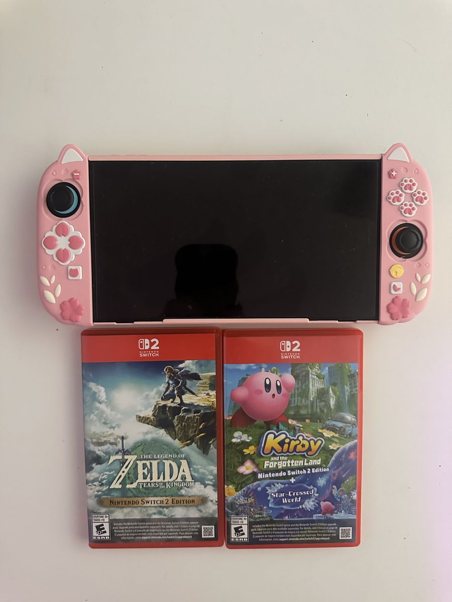 Pink Nintendo Switch 2 with Zelda: Tears of the  and Kingdom & Kirby and the Forgotten Land. Call or text, I don’t bite.