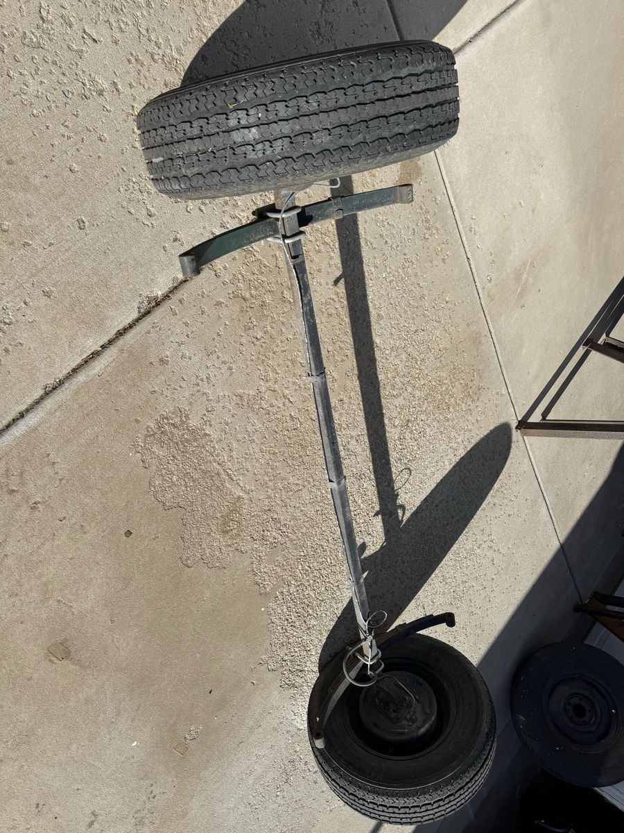 Boat trailer axle and trailer receiver