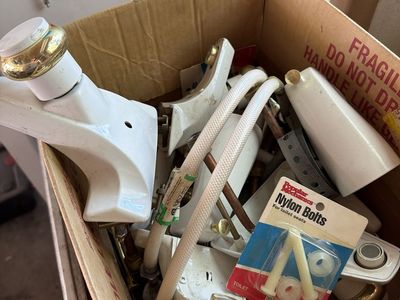 Hardware and faucets. White and gold for bathroom and cabinets.