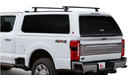 LEER 100XQ Sport Fiberglass Truck Cap with a Thule Tracker roof rack