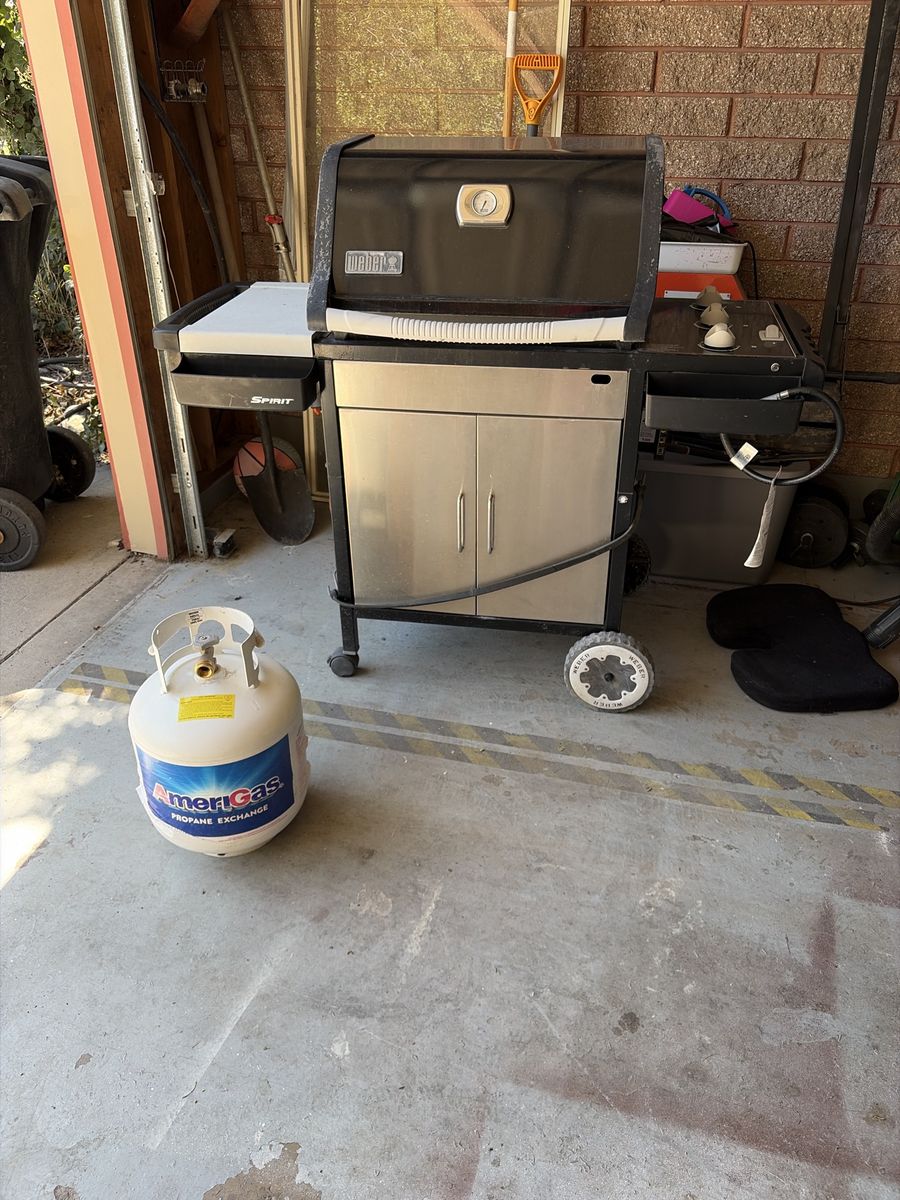 Weber Spirit 3-Burner Propane Gas Grill with Tank Included