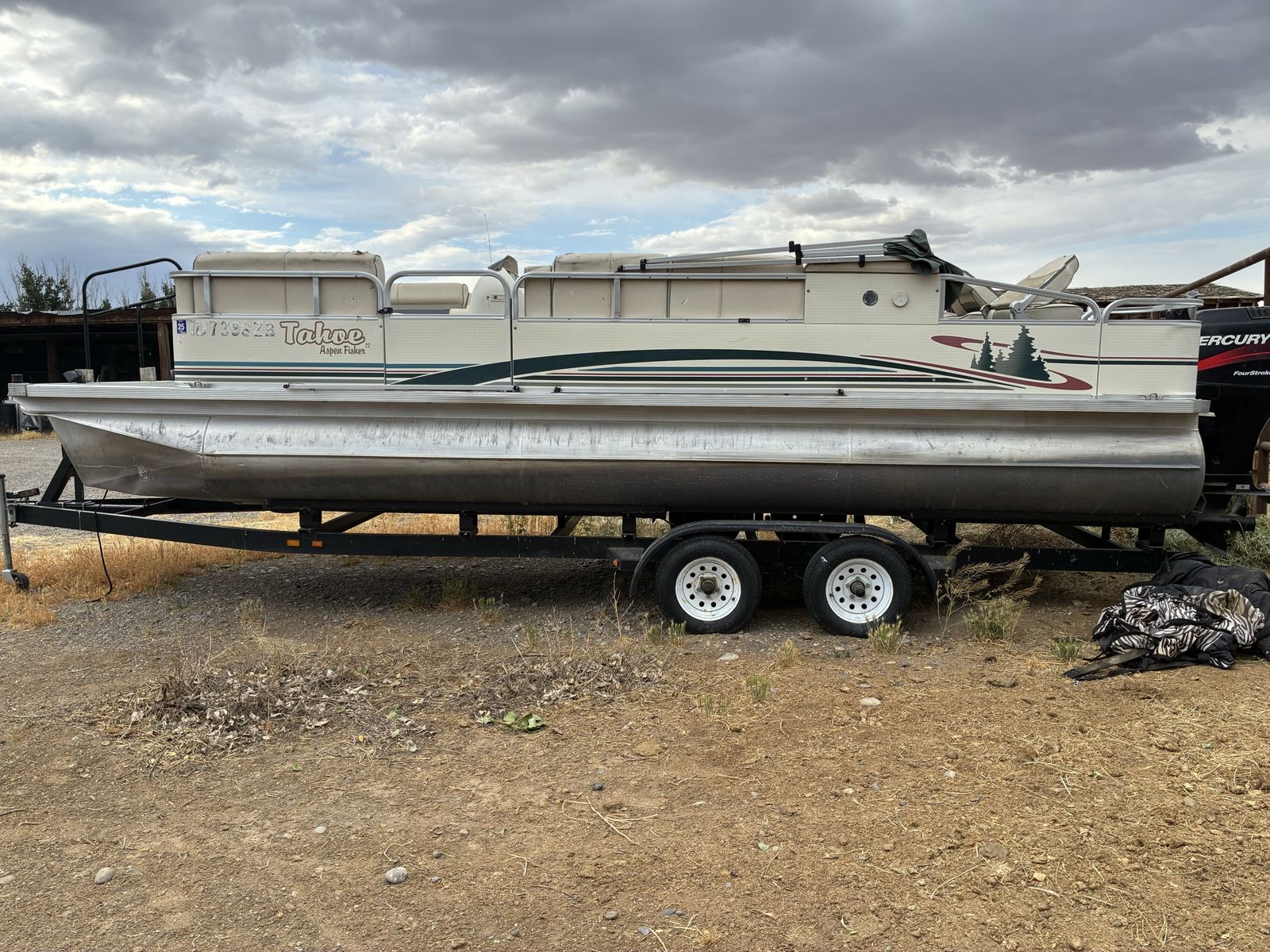Tahoe Pontoon Boat with Mercury FourStroke Outboard and Trailer - Good Condition, Ready for the Water
