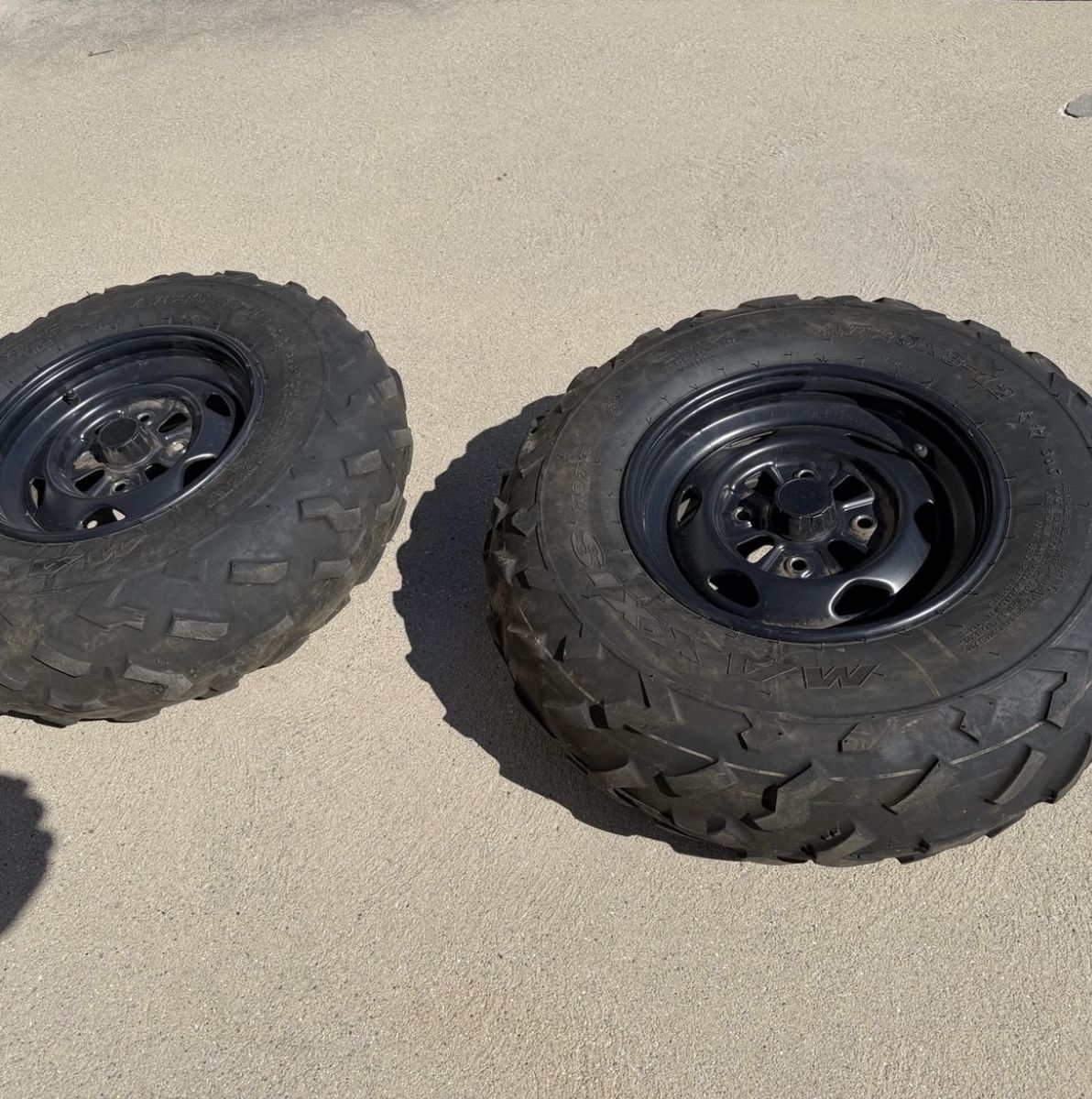 Two ATV Tires and Wheels
