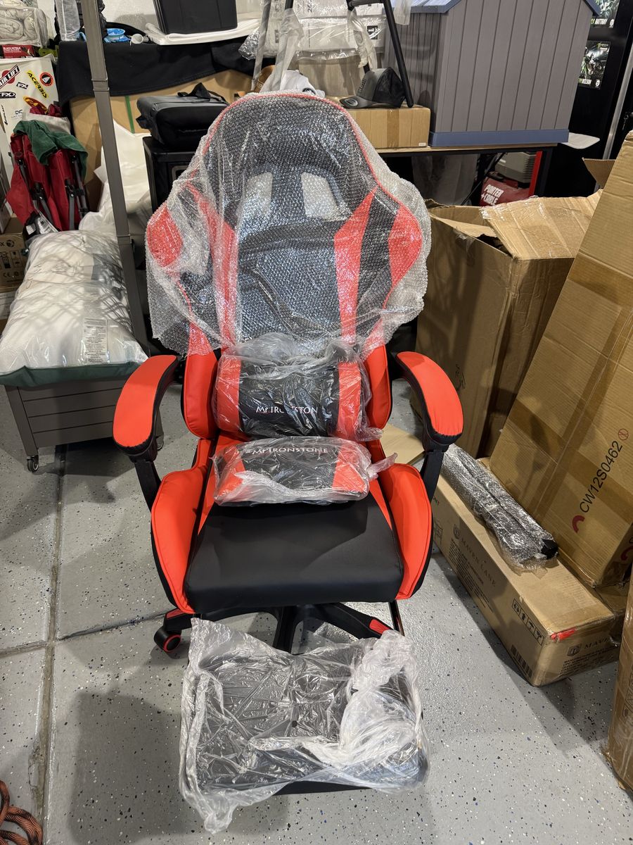 Mr Ironstone Red & Black Ergonomic Gaming Chair with massaging Lumbar Support and Footrest.