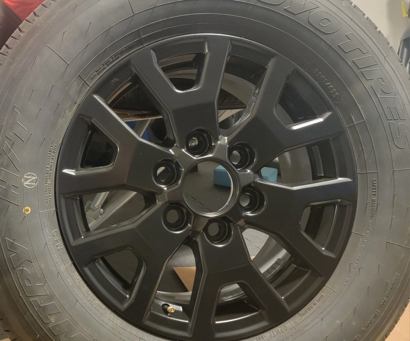 Toyo Open Country A38 All-Season Tire Set with Black Rims (265/60R18) - UsedGood
