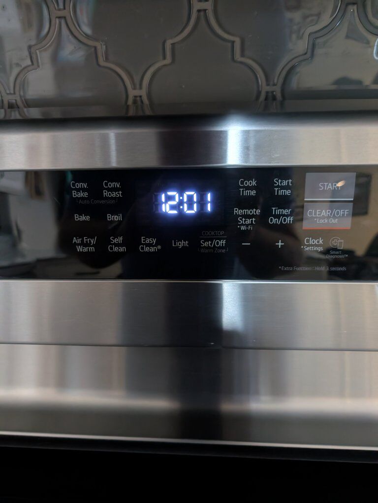 2-Year-Old electric glass top stove