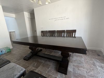 Large Dark Wood Dining Table with Trestle Base and Chairs