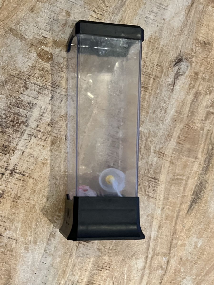Small Plastic Tower Tank Display Container with Power Cable Used