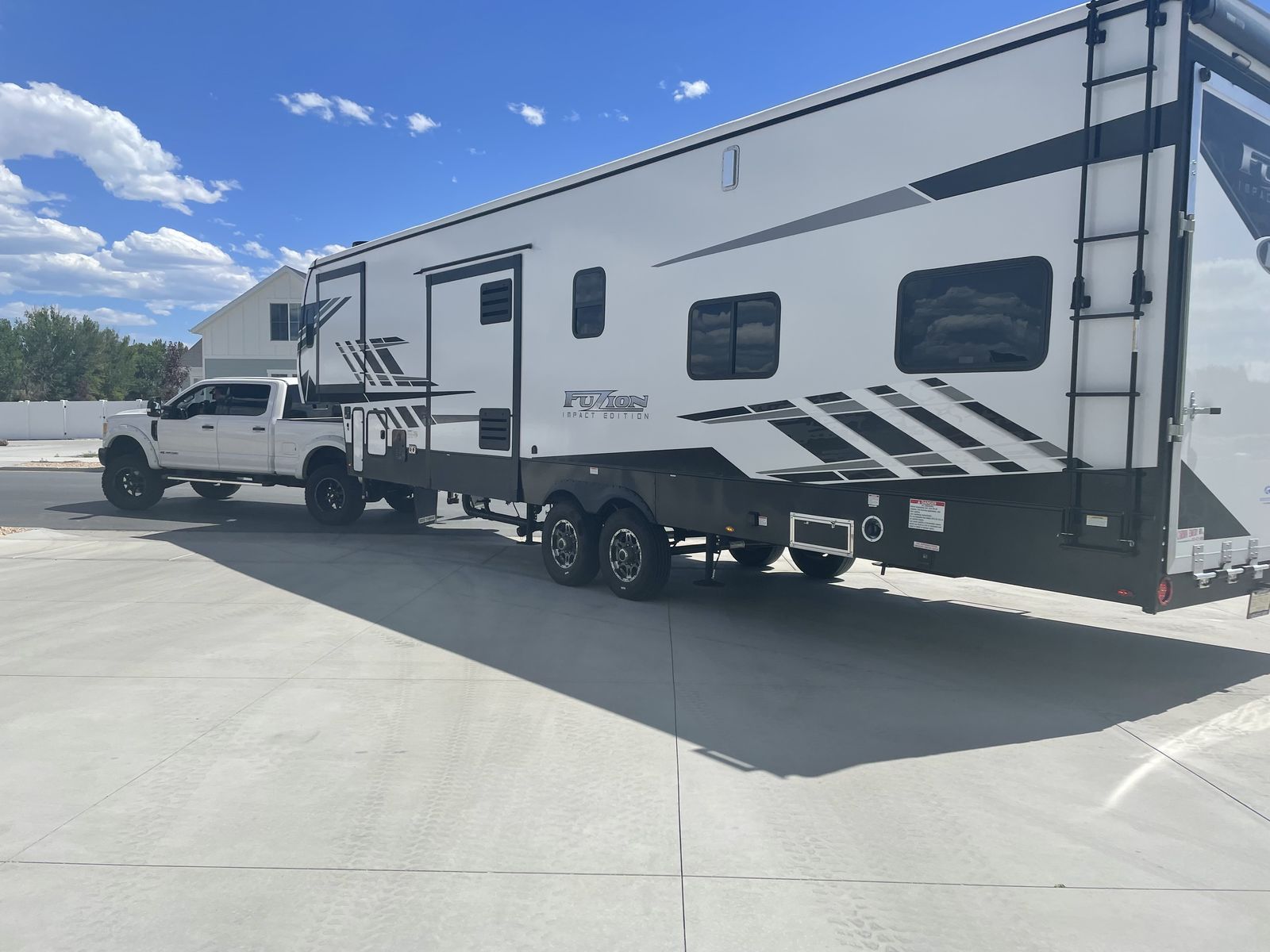2022 Keystone Fuzion with 14ft separate garage
