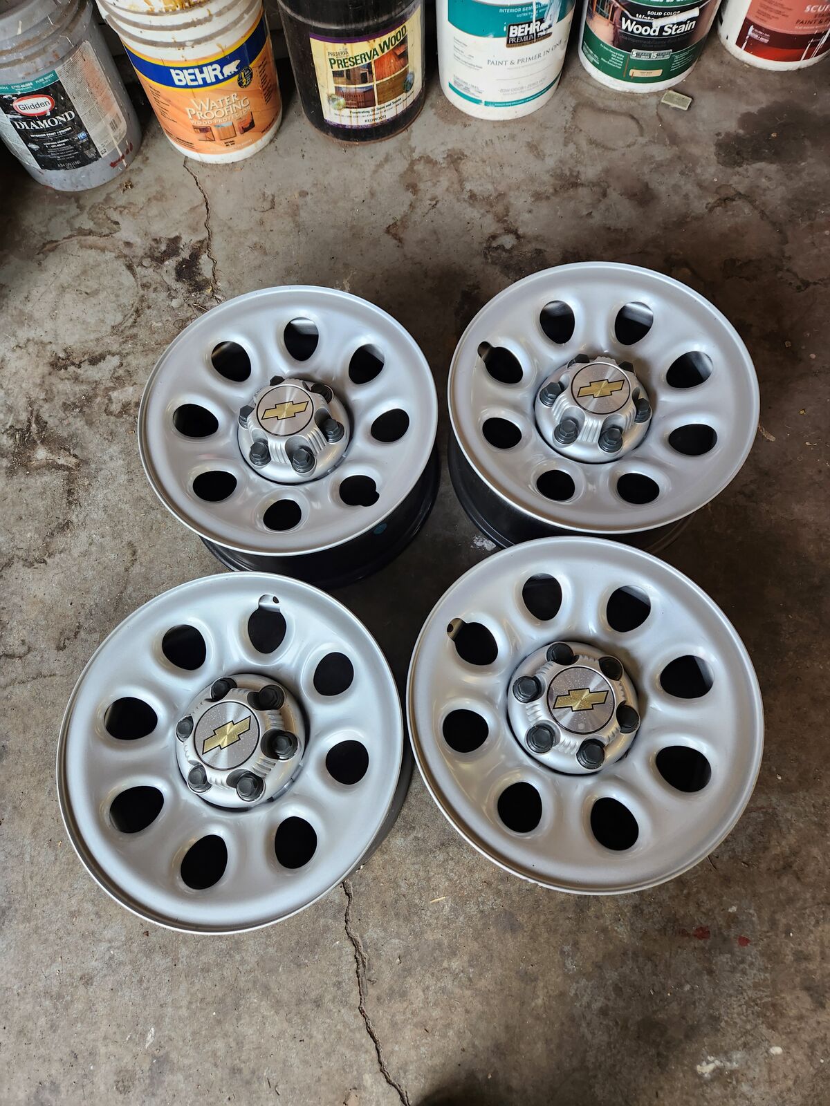 Chevrolet Silverado 1500 stock 6 lug wheels / rims 17 x 7.5 with caps and lug nuts