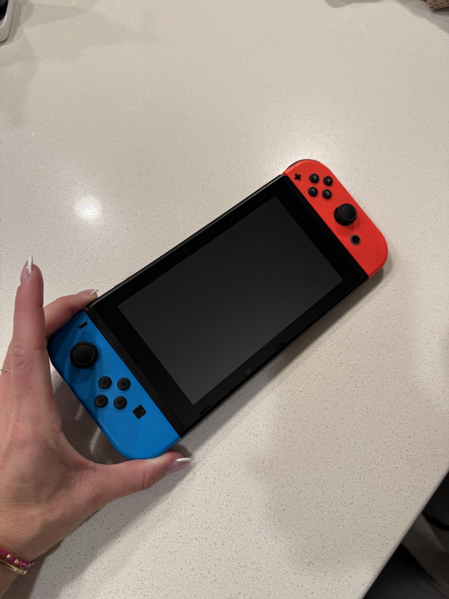 Nintendo Switch (Barely Used In Great Condition)