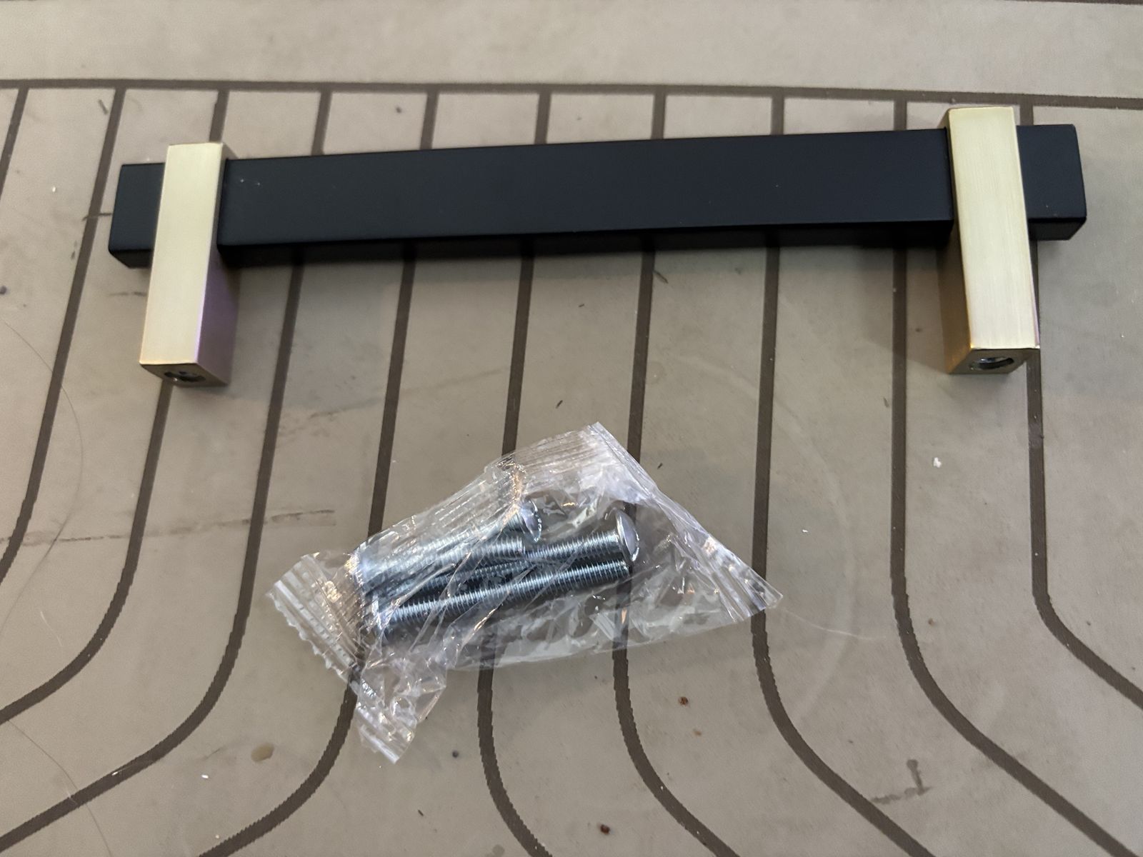 #+ Cabinet Handles Matte Black and Gold 6-1/8 inches with 5-1/8 Center Holes BP36724MBBBZ