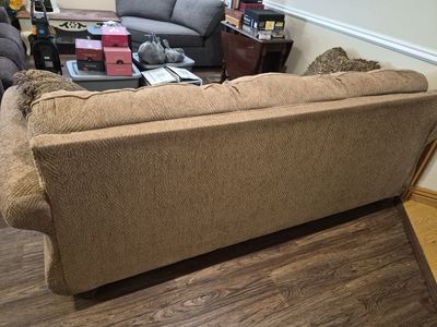 Couch with decorative carved wood for sale. (150 minimum but will accept best offer)