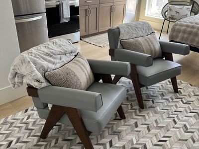 Nice high-end chairs - gray/blue leather & wood.