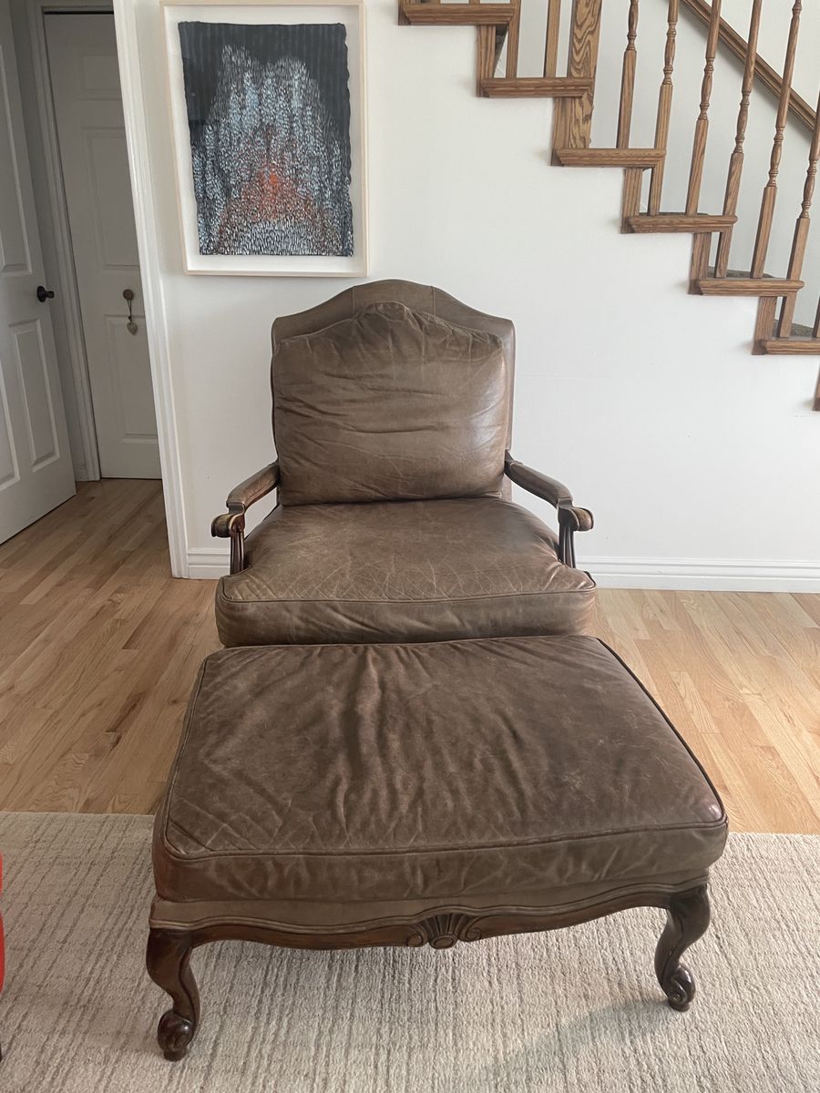 Brown leather chair and ottoman