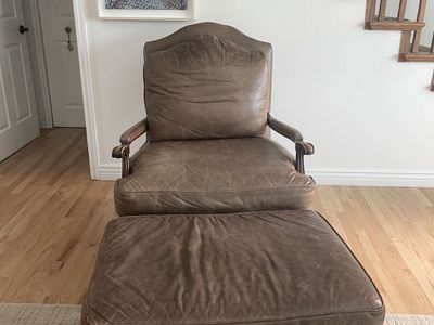 Brown leather chair and ottoman