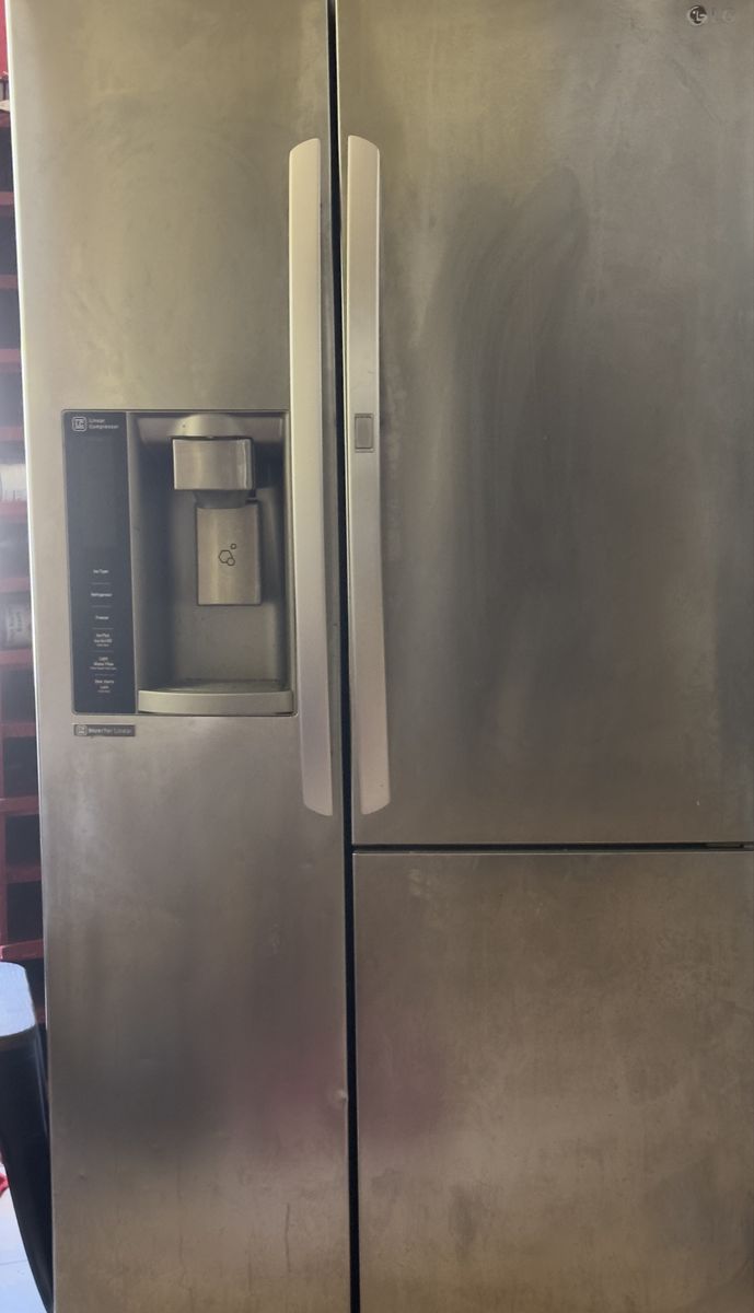 LG Side-by-Side Refrigerator Stainless Steel with Ice/Water Dispenser - Used