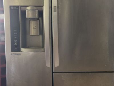 LG Side-by-Side Refrigerator Stainless Steel with Ice/Water Dispenser - Used