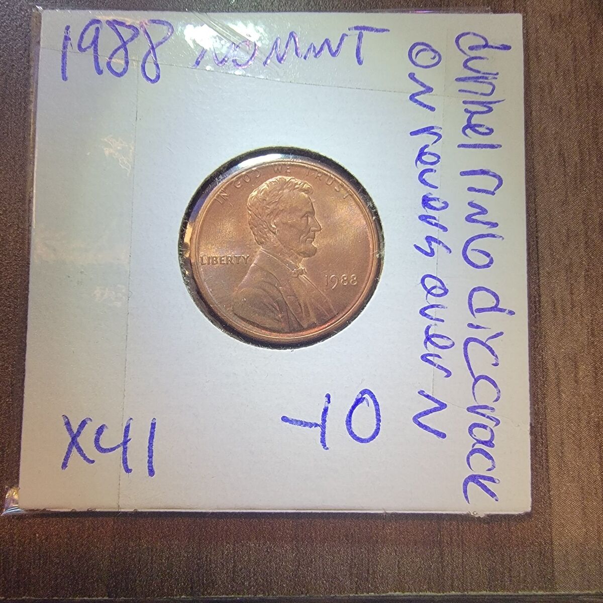 1988 penny with double ring defect.