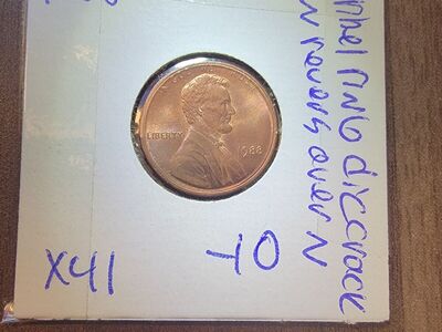 1988 penny with double ring defect.