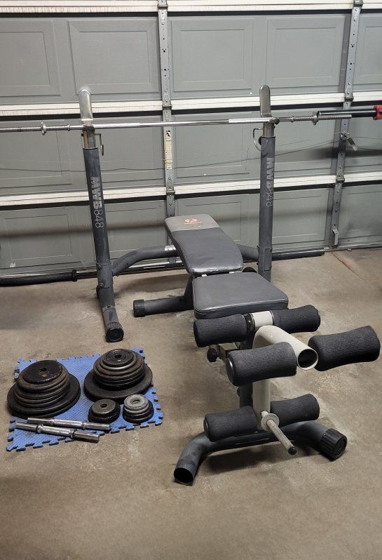 Bench and 210 pounds of weights