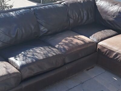 nice two piece leather couch/lounge/sectional