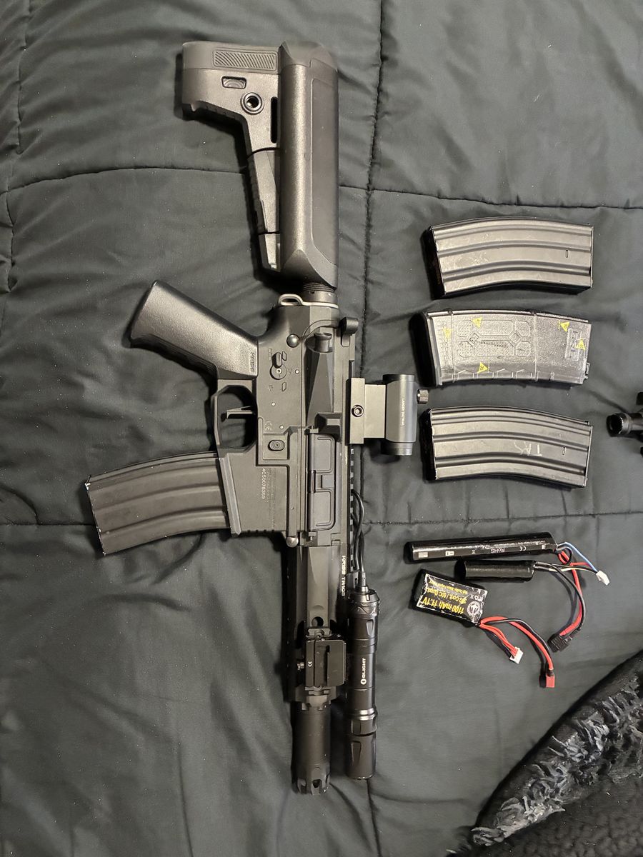 Trident Airsoft AR with mags and batteries and scope, flashlight, tracer, etc