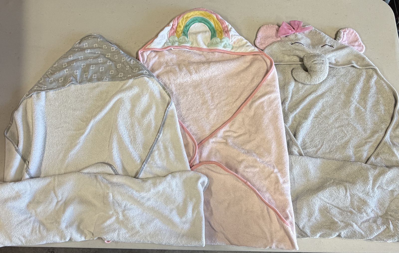 Three baby towels with hoods