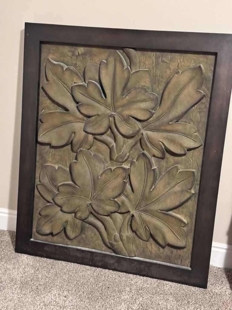 Carved Leaves In Wood Artwork