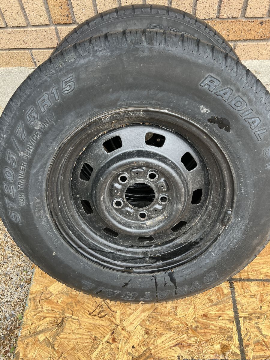 Two trailer tires on 5x4.5 steel wheels