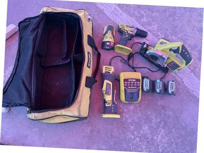 Ryobi tool kit, 12 V drill, circular saw, reciprocating, saw, flashlight and storage bag