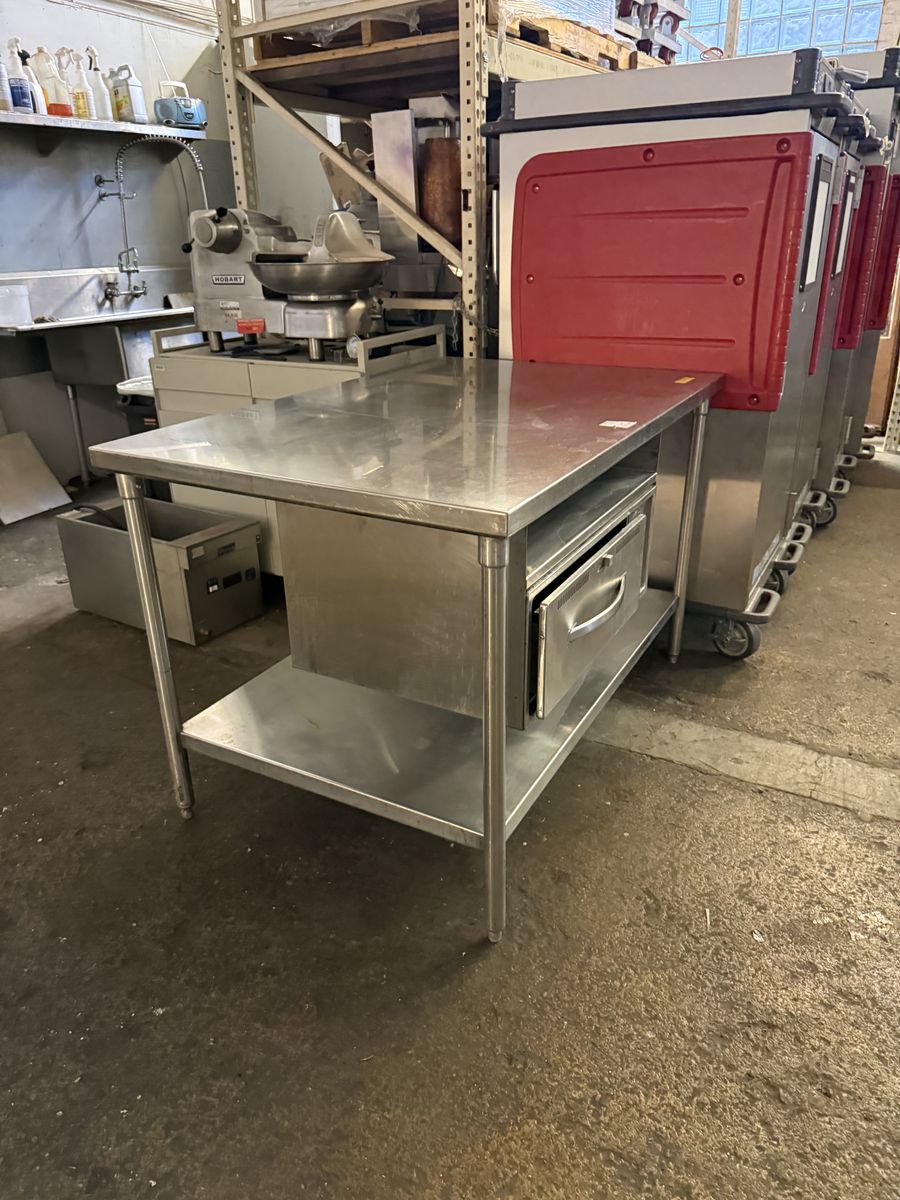 Used Stainless Steel Table With Food Warmer in great working condition 115 Volts