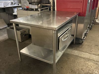 Used Stainless Steel Table With Food Warmer in great working condition 115 Volts