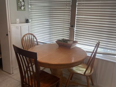 Cute wooden table (plus chairs)