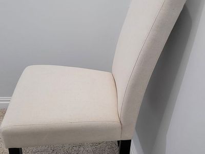 Upholtered dinning chairs. SET OF TWO