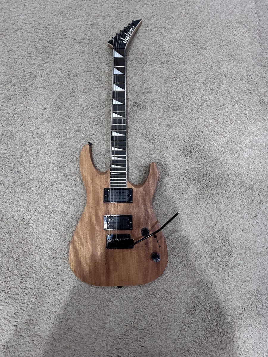 Jackson Electric Guitar - Brown, 6-String, Tremolo Bar, Pointed Headstone -Natural Color