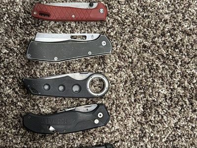 Assorted Pocket Knives Lot featuring Kershaw, Gerber, and Smith & Wesson