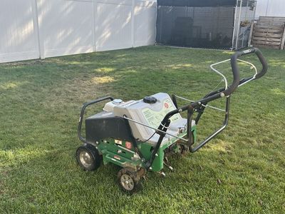 CNC Lawn Specialties Lawn Aerating and Power Raking