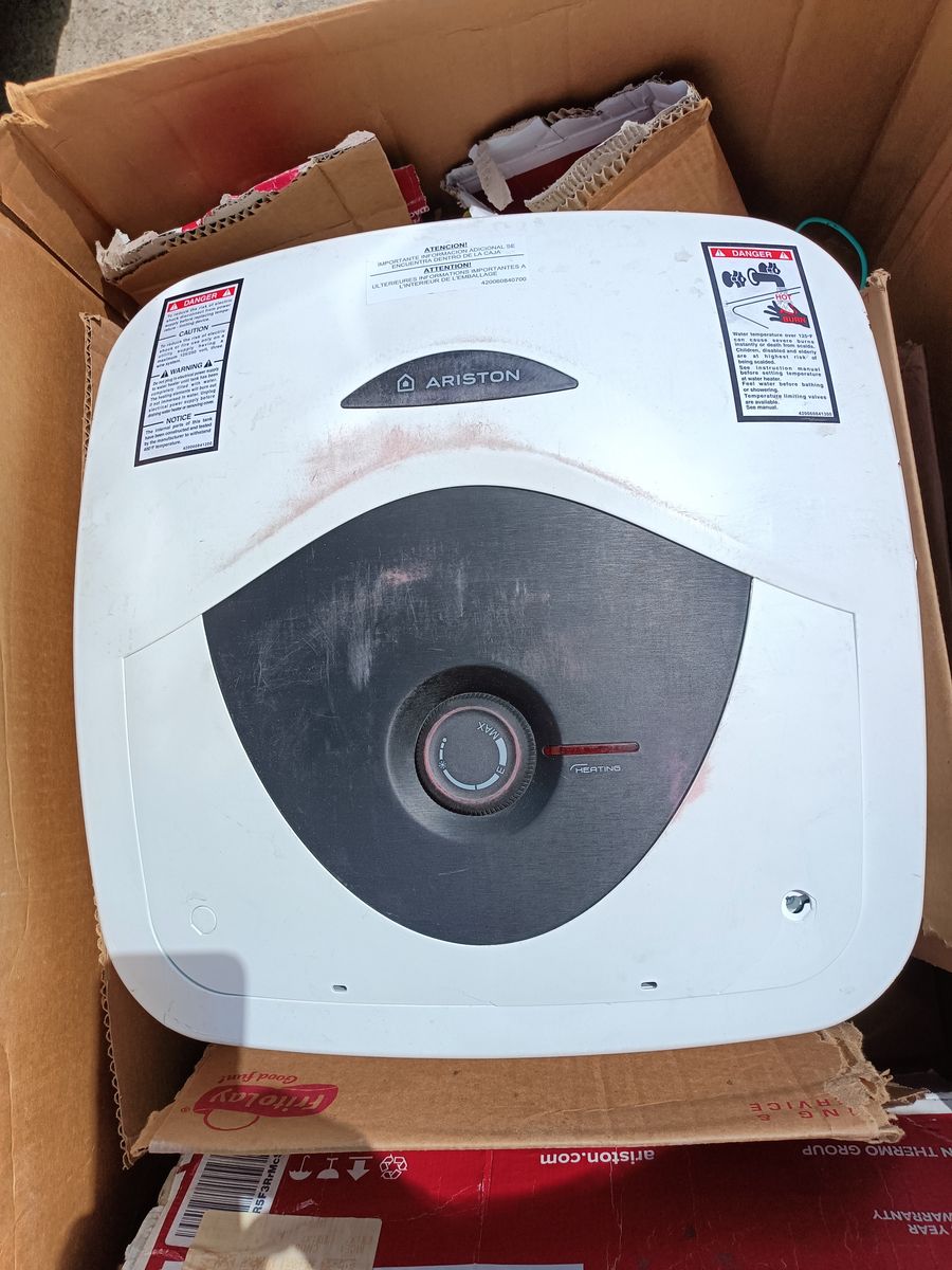 8 gallon electric hot water heater. 110 volt. New or near new.