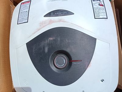 8 gallon electric hot water heater. 110 volt. New or near new.