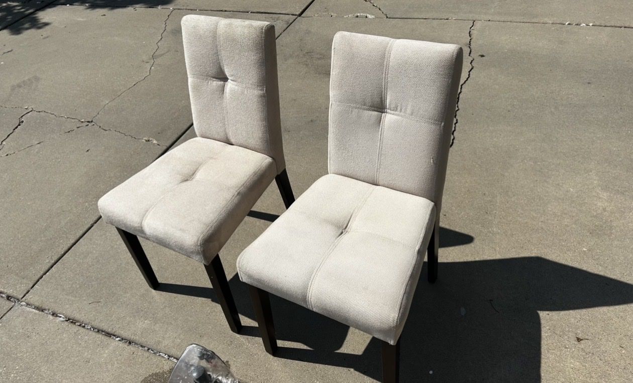 Pair of Upholstered Light Beige Dining Chairs with Dark Wood Legs